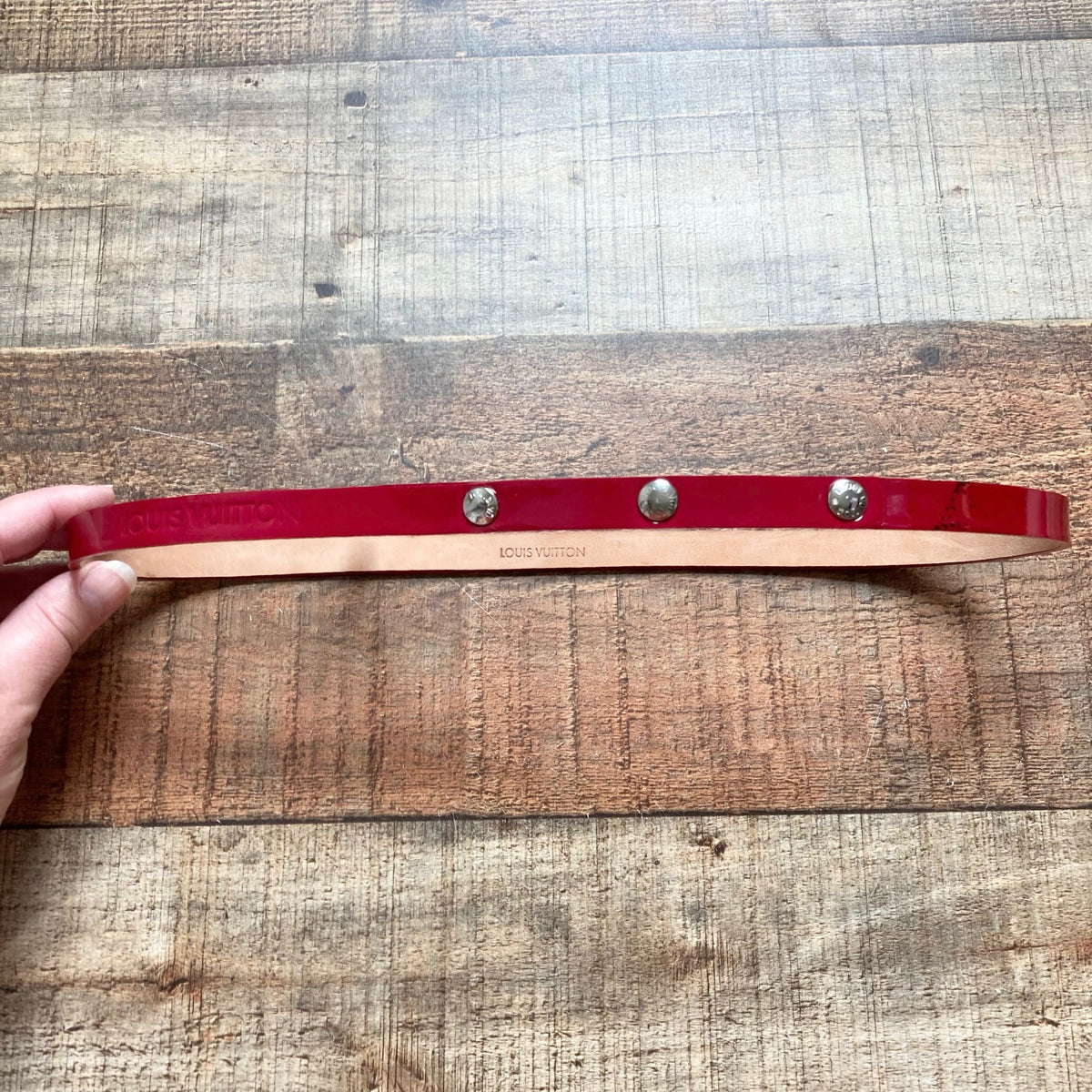 red and gold louis vuittons belt