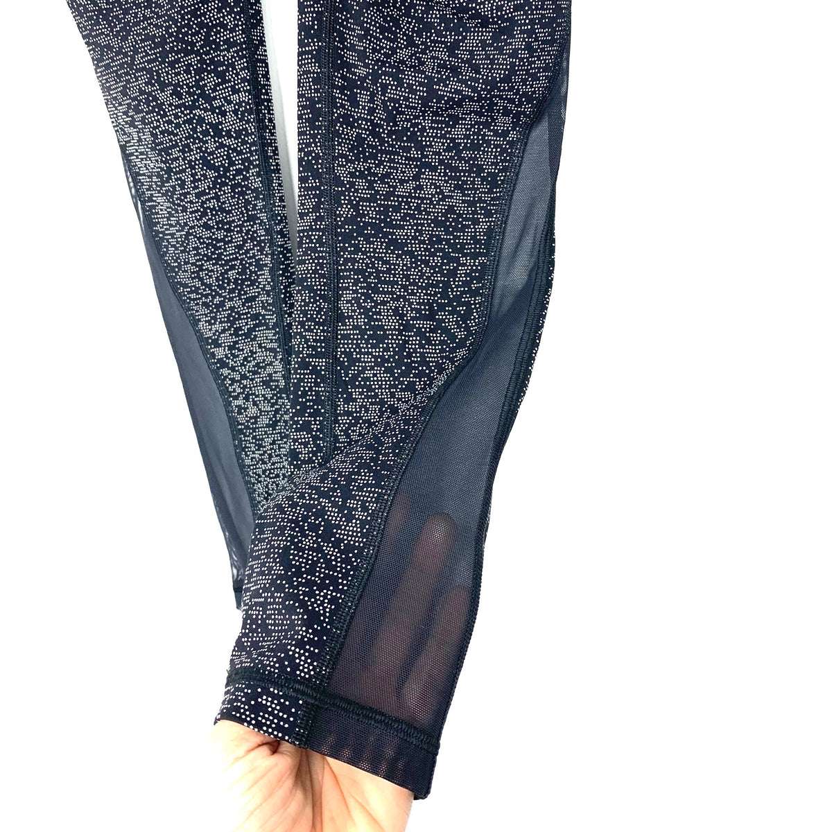 Lululemon Black & White speckled tights with mesh side pockets size 4