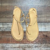 Anthropologie Metallic Gold Thong Sandals- Size 9