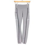 Lululemon Light Grey With Black/Silver Metallic Stripe, Side Pockets, Zipper On Back Waistband- Size 4 (Inseam 27")