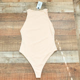 ReoRia Nude Bodysuit NWT- Size M