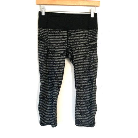 Lululemon Black Crop Legging with Palm Print and Stripe Overlay (with Side Zipper Pocket and Curved Hemline)- Size 4 (Inseam 17”)