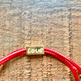 No Brand Gold CZ Cross with Red Strap and Gold Love Spacer Bracelet