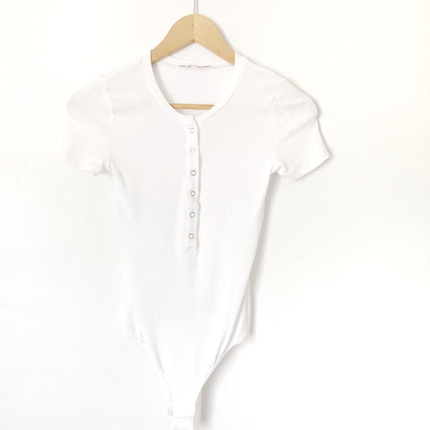 Olivaceous White Half Button Up Short Sleeve Thong Bodysuit- Size S (see notes)