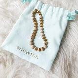 enewton Gold and White Stretch Bracelet with Bag